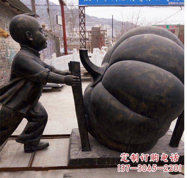 重庆公园推南瓜的小男孩小品铜雕