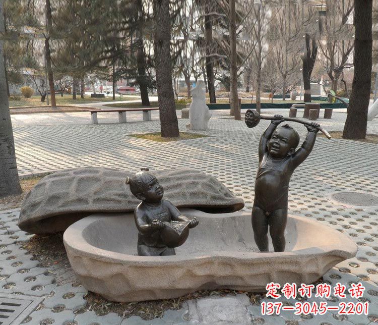 重庆拿莲蓬和石榴的小孩铜雕