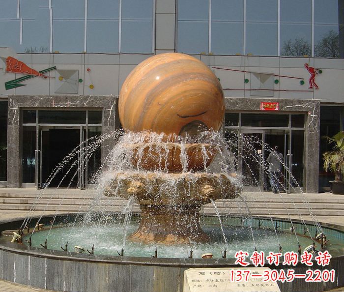 重庆石来运转球晚霞红风水球石雕