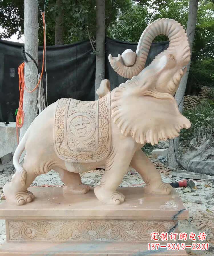 重庆晚霞红卷元宝大象雕塑