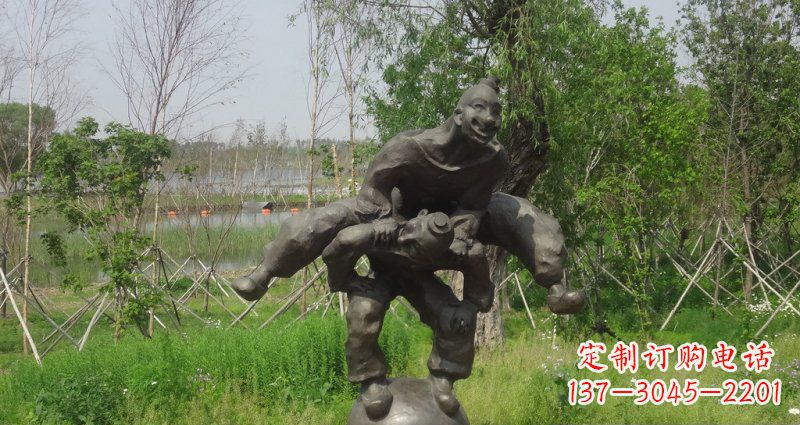 重庆园林站在球上面跳山羊的人物景观铜雕
